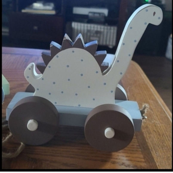 Blue dotted dinosaur wooden pull toy - Picture 2 of 4
